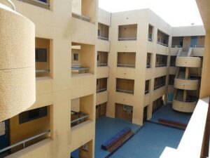 (Pictured here is a wonderful open-air courtyard, contained within a classroom building at one Saudi college.)